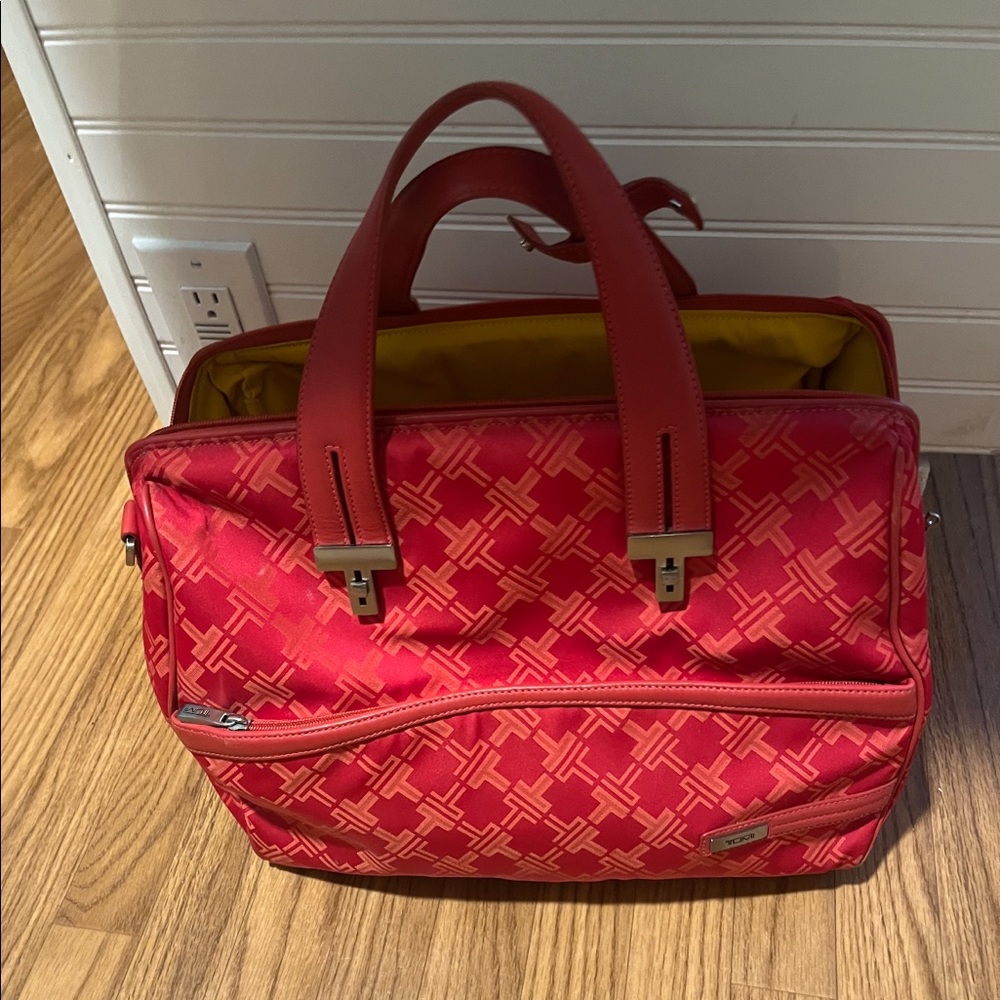 Red Tumi bag